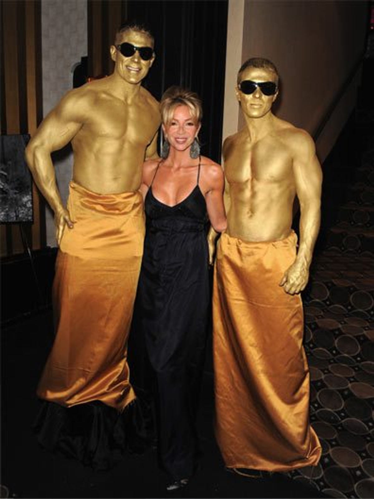 Carla Collins and the golden boys. Photography by Tom Sandler