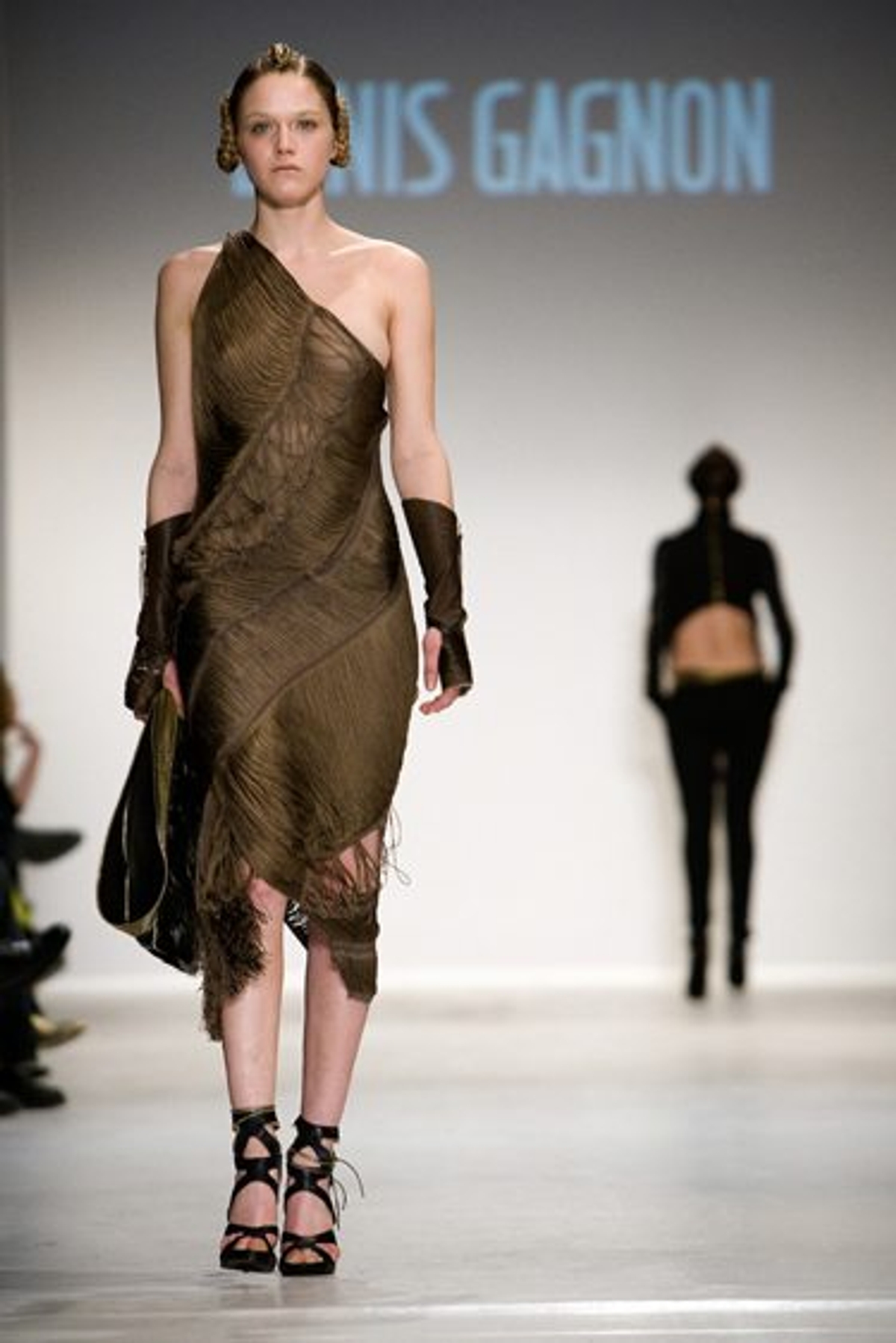 Model Dana Drori walks at Denis Gagnon's fall show at Montreal Fashion Week