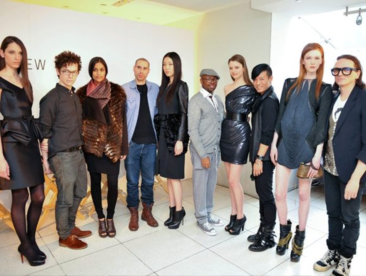Holt Renfrew's group of Canadian designer pose with their models at the Holt Renfrew media breakfast. Photography by George Pimentel/Courtesy of Holt renfrew