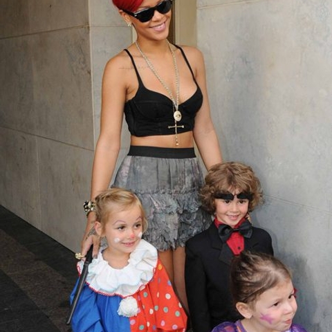 Rihanna adds a clown, a princess and a ringmaster to her entourage