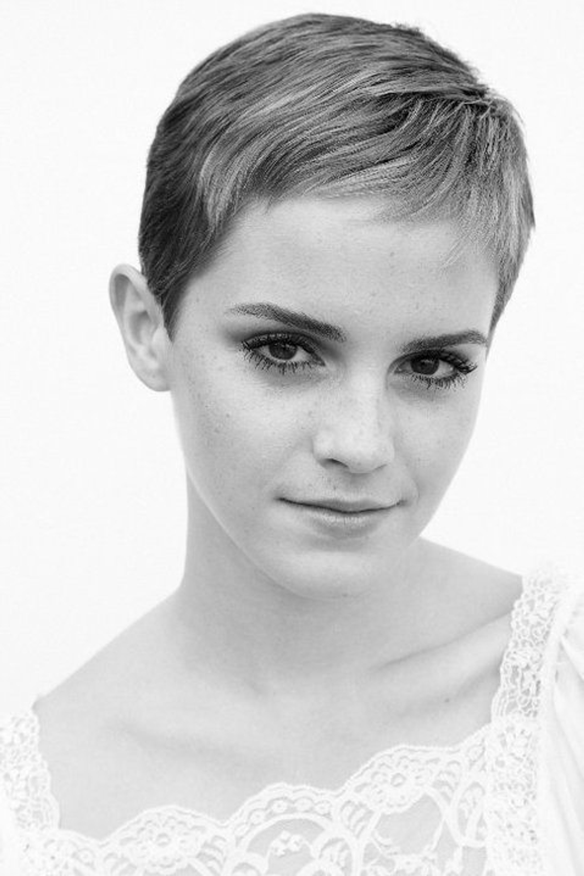 Emma Watson isn't getting the boot from Burberry, but did chop off her hair