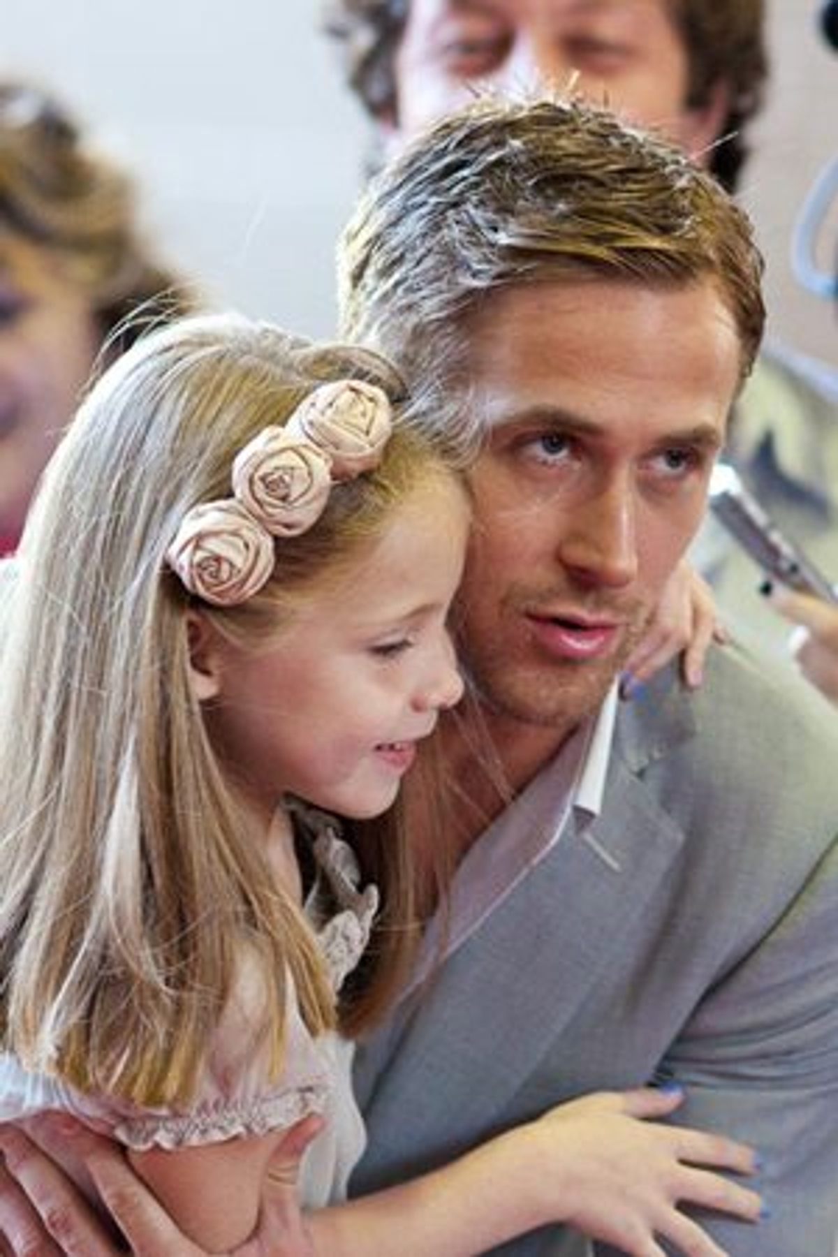 Ryan Gosling hoists co-star Faith Wladyka at the Blue Valentine premiere. Photography Sam Javanrouh