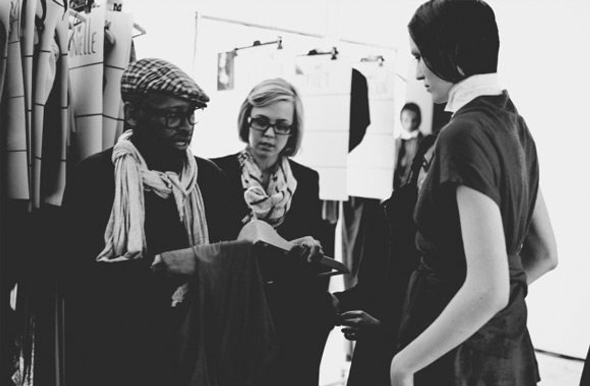 Designer Kirk Pickersgill preps a model backstage at the Greta Constantine spring show. Photography by Jonathan Loek