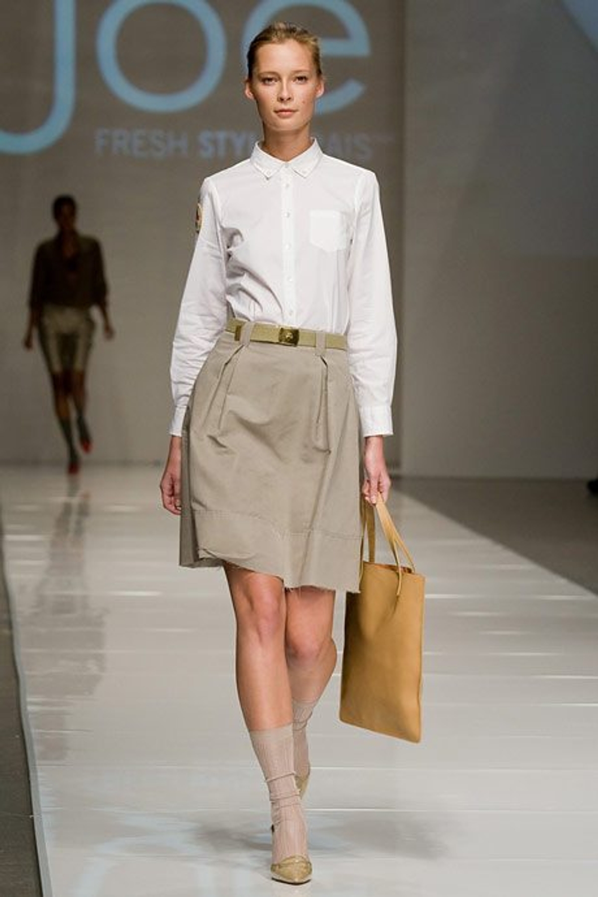 Tiiu Kuik opens yesterday's Joe Fresh Style show. Photography by Jenna Marie Wakani