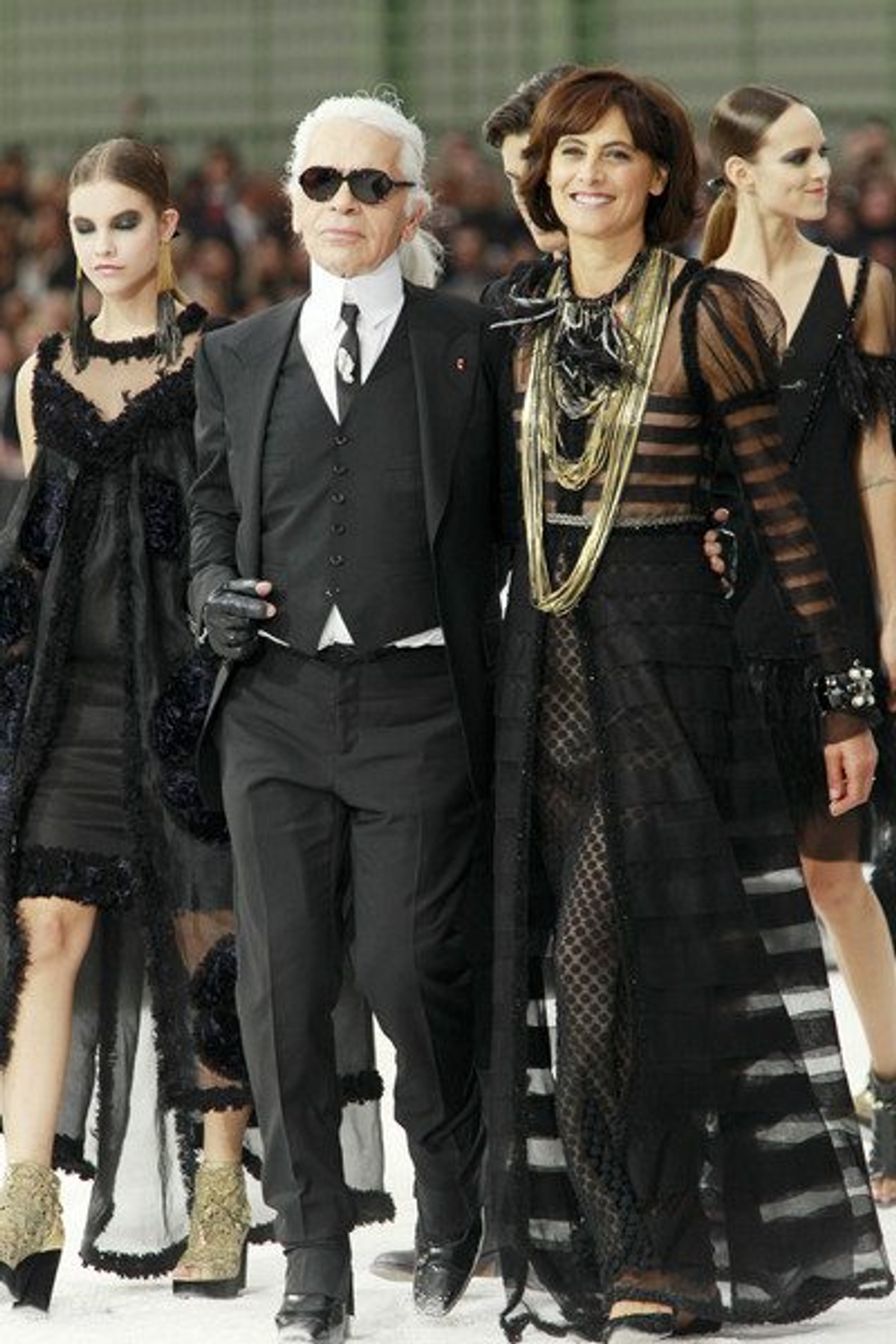 Karl Lagerfeld and Inès de la Fressange at the Chanel Spring 2011 show. Photography by Peter Stigter