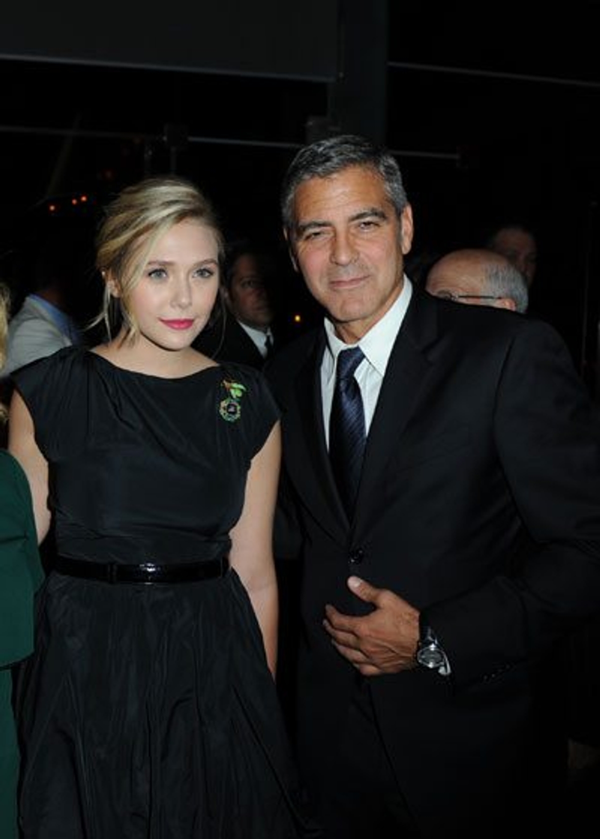 Elisabeth Olsen and George Clooney.