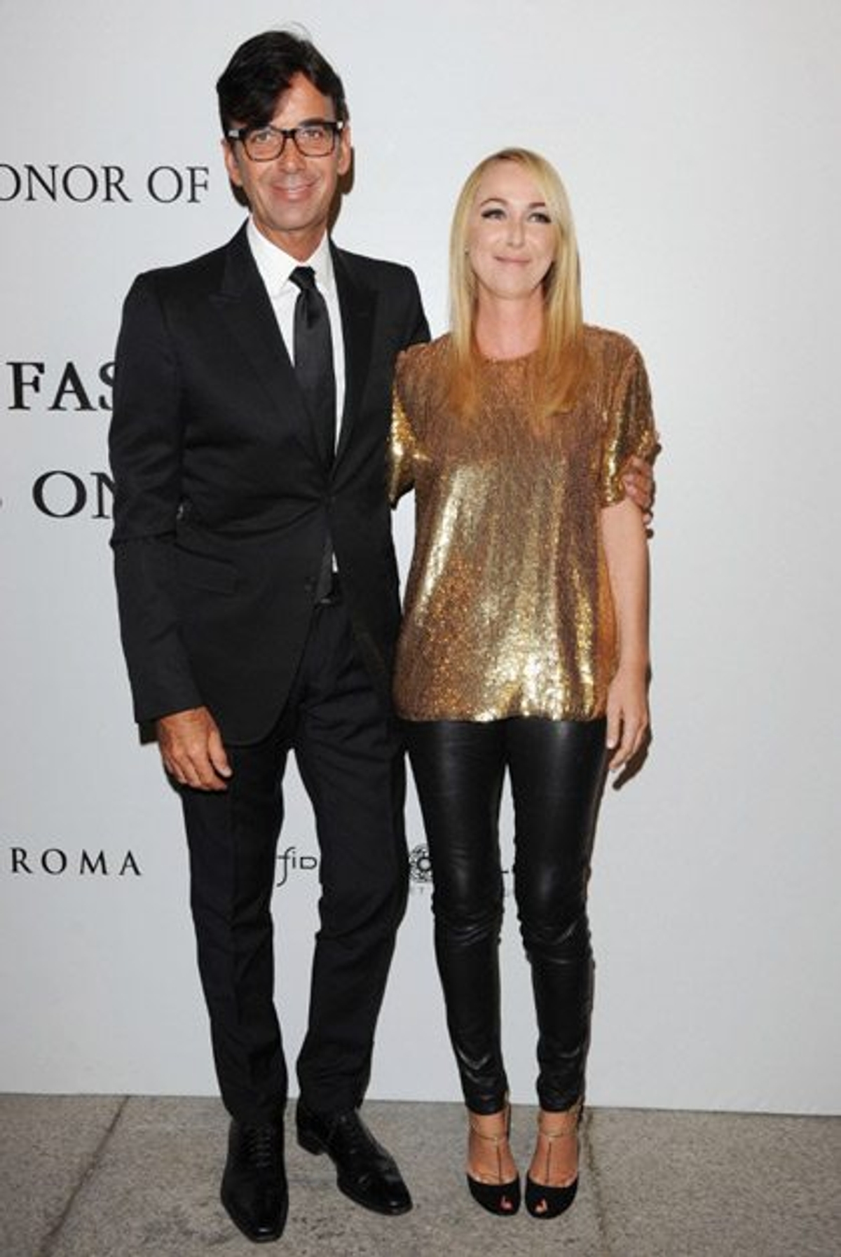 Patrizio Di Marco and Frida Giannini Photo by WireImage