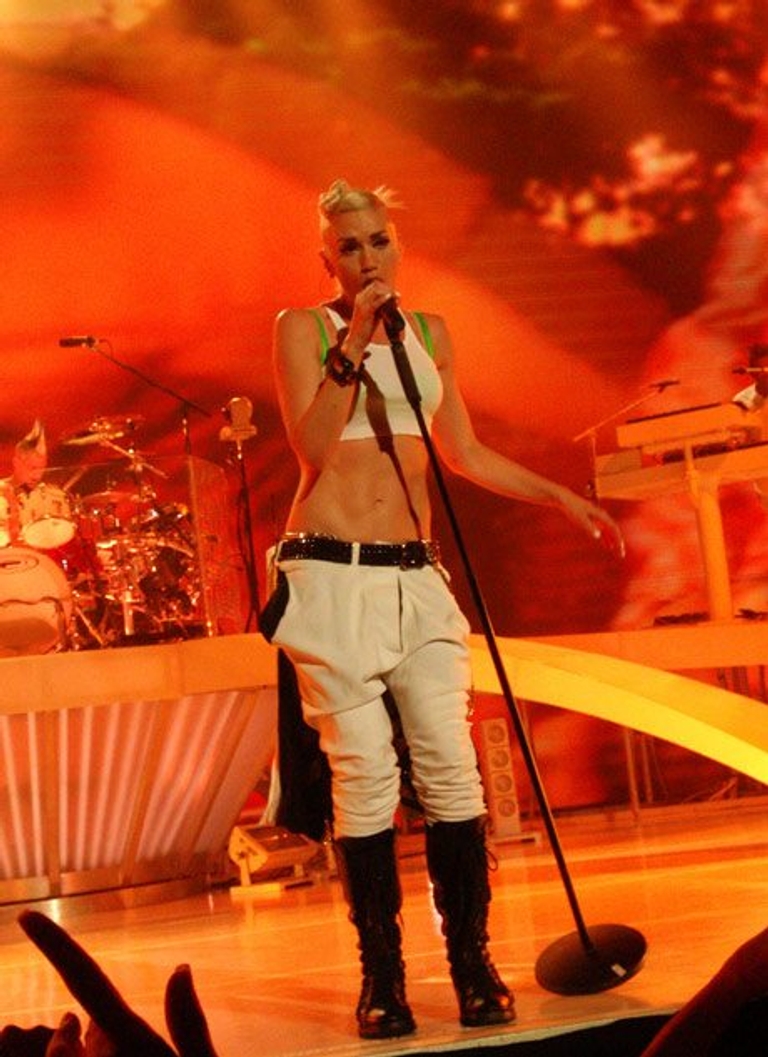 Gwen Stefani crop top On the eve of No Doubt's comeback, we look back at Gwen and the band's top 10 fashion moments (bindis, braces and all!)