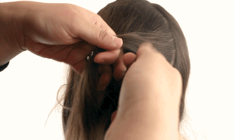 Master a braided crown once and for all with this Valentine's Day hair gif tutorial