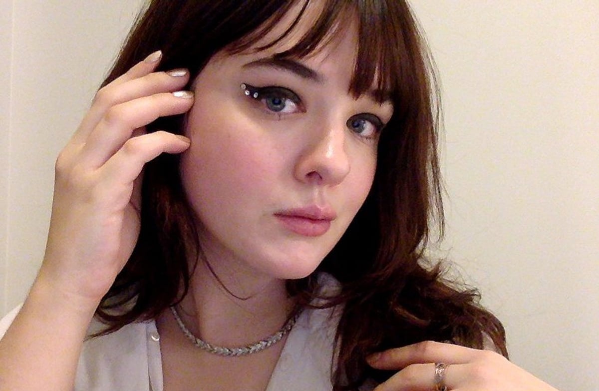 This rhinestone makeup tutorial proves there's nothing more festive than gluing stuff to your face