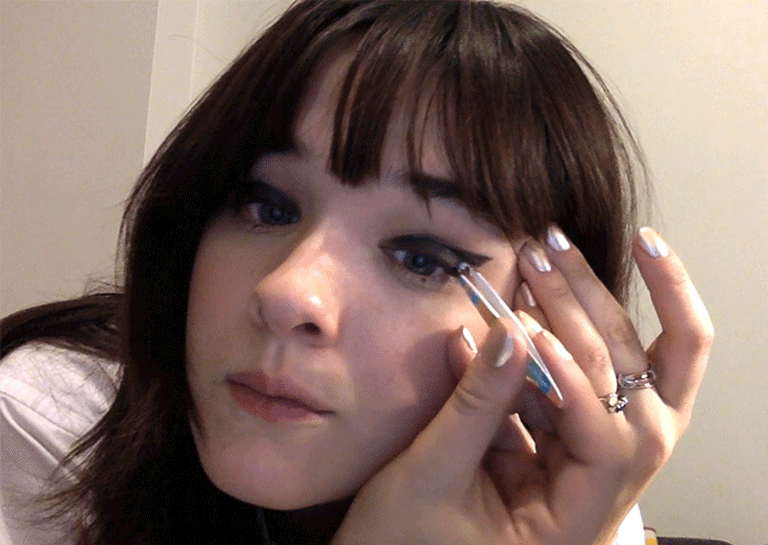 This rhinestone makeup tutorial proves there's nothing more festive than gluing stuff to your face