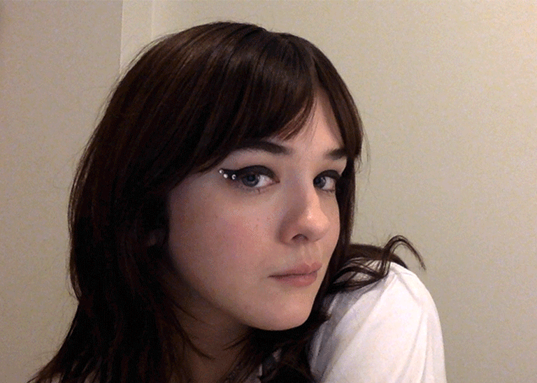 This rhinestone makeup tutorial proves there's nothing more festive than gluing stuff to your face