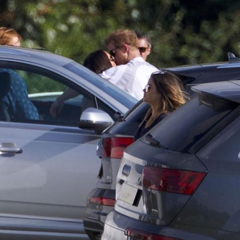 Meghan Markle and Prince Harry Share a Kiss at Their First Public Appearance