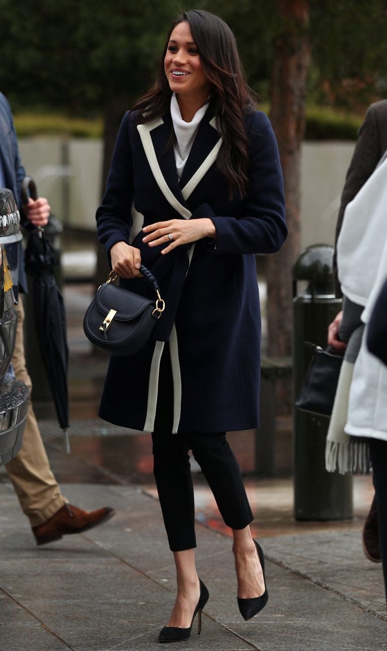 Meghan Markle Wears Navy as a Neutral for Appearance on International Women’s Day