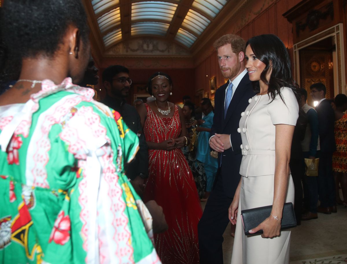 Meghan Markle Wears Prada to Awards Ceremony at Buckingham Palace