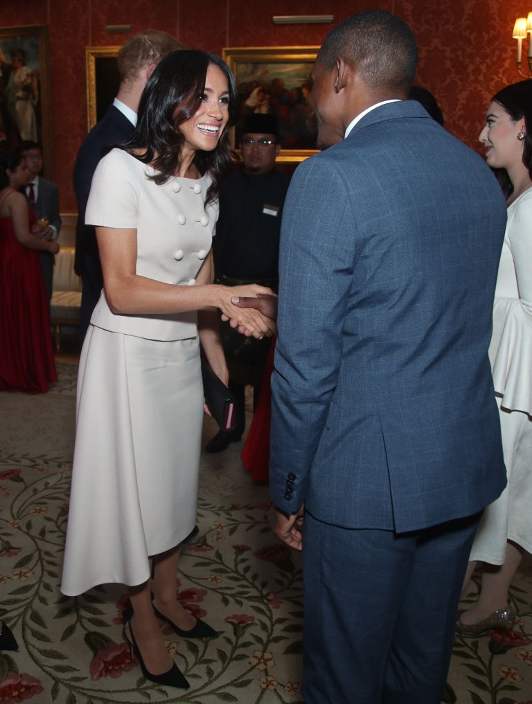 Meghan Markle Wears Prada to Awards Ceremony at Buckingham Palace