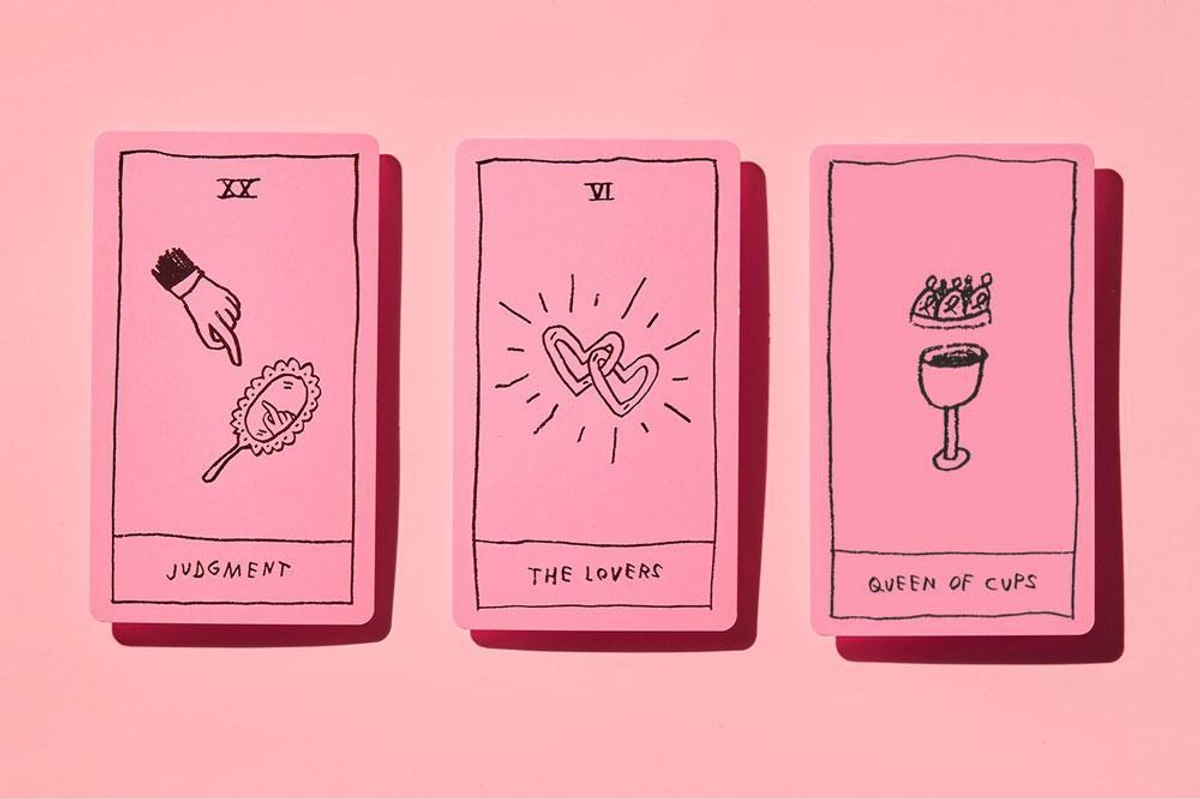 Pink and black tarot card deck