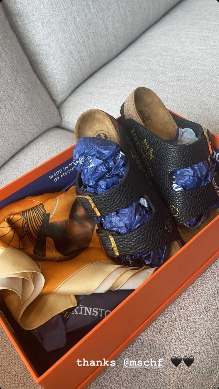 A pair of 'Birkinstock' sandals made out of an Hermès bag
