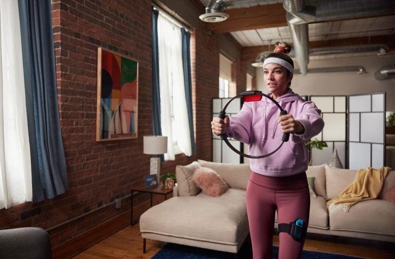 Actress Annie Murphy playing Nintendo Switch