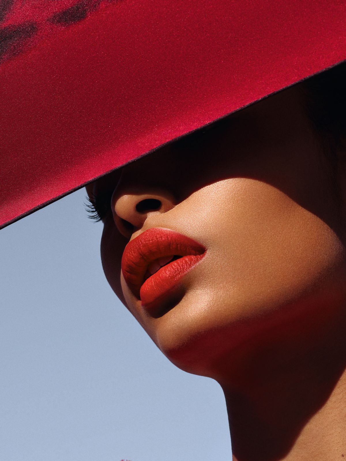 model with red dior lipstick