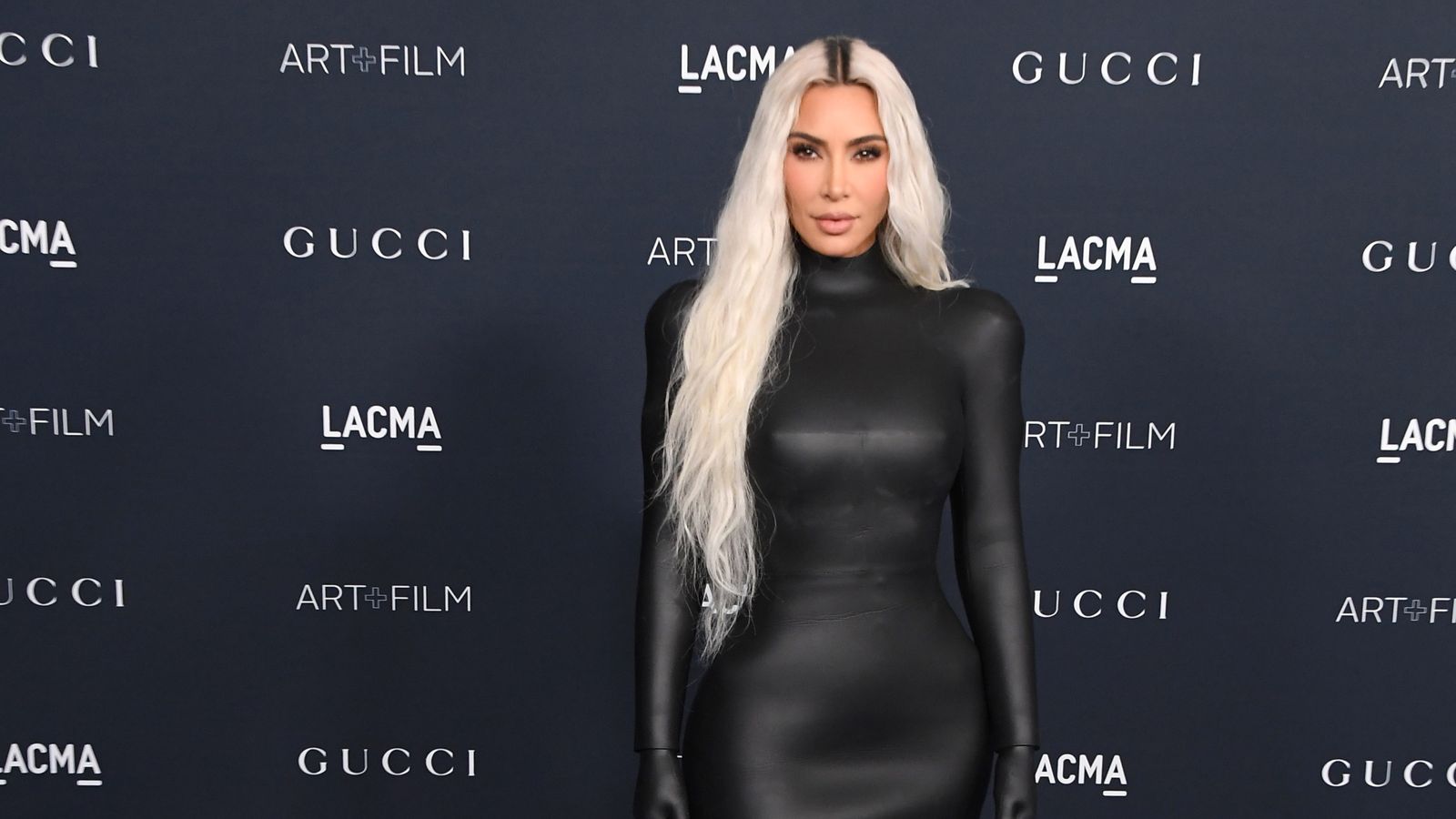 knee length dresses for ladies Kim Kardashian Deep V-Neck Sheer Draw String Bodycon Dress main image 1