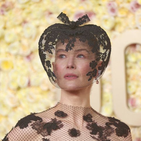 Rosamund Pike's Golden Globes Look Was Peak Saltburn
