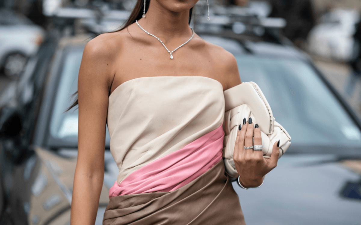 woman holding toiletry bag, travel toiletry bags
