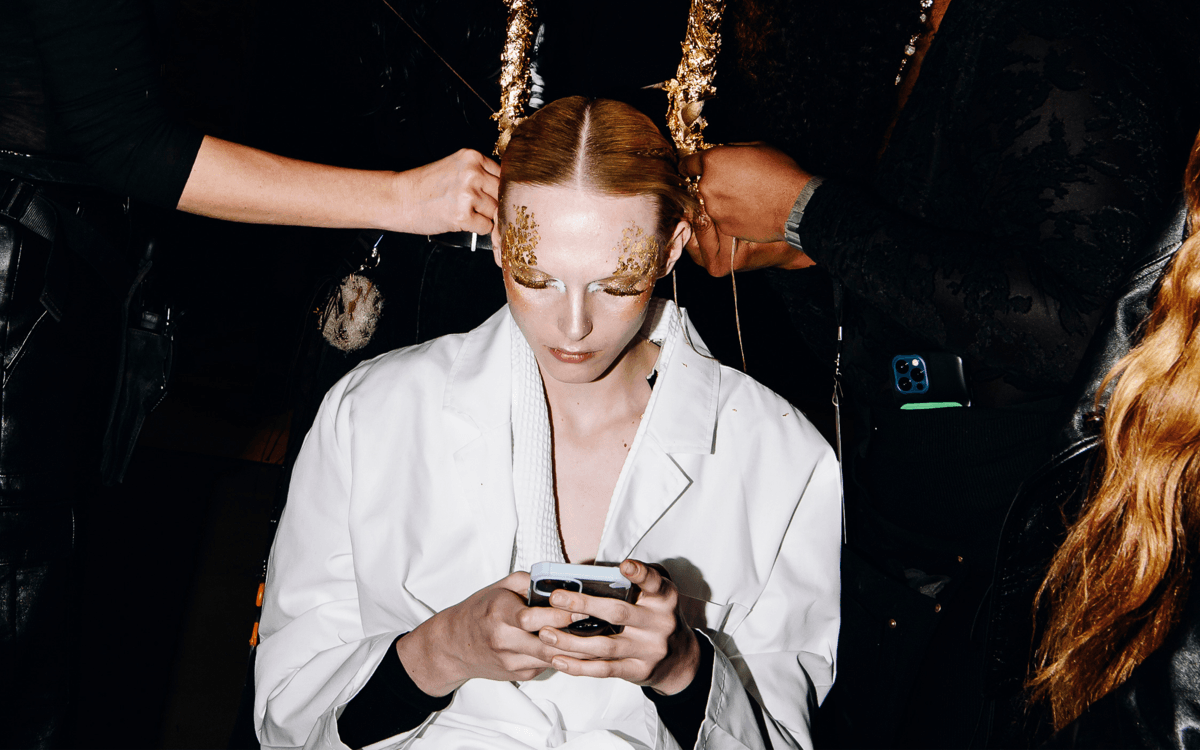 Skincare trends: face tape, at-home microneedling, model Alex Consani uses her phone backstage