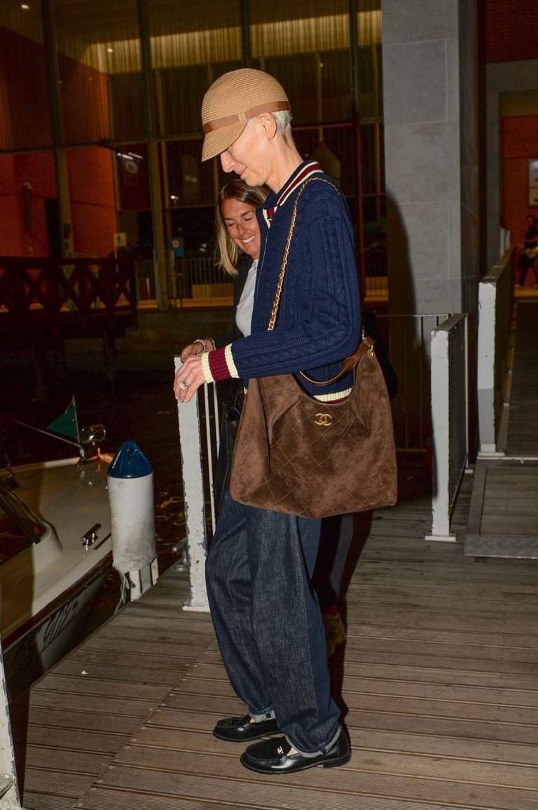 Actress Tilda Swinton makes a chic landing in Venice ahead of Film Festival.