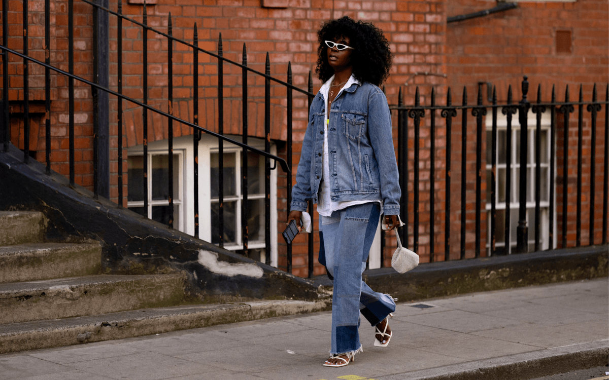 Best jeans Canada: A person in a denim jacket and blue denim jeans