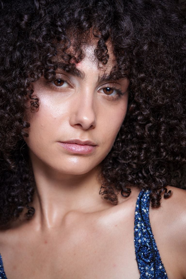 how to style curly bangs