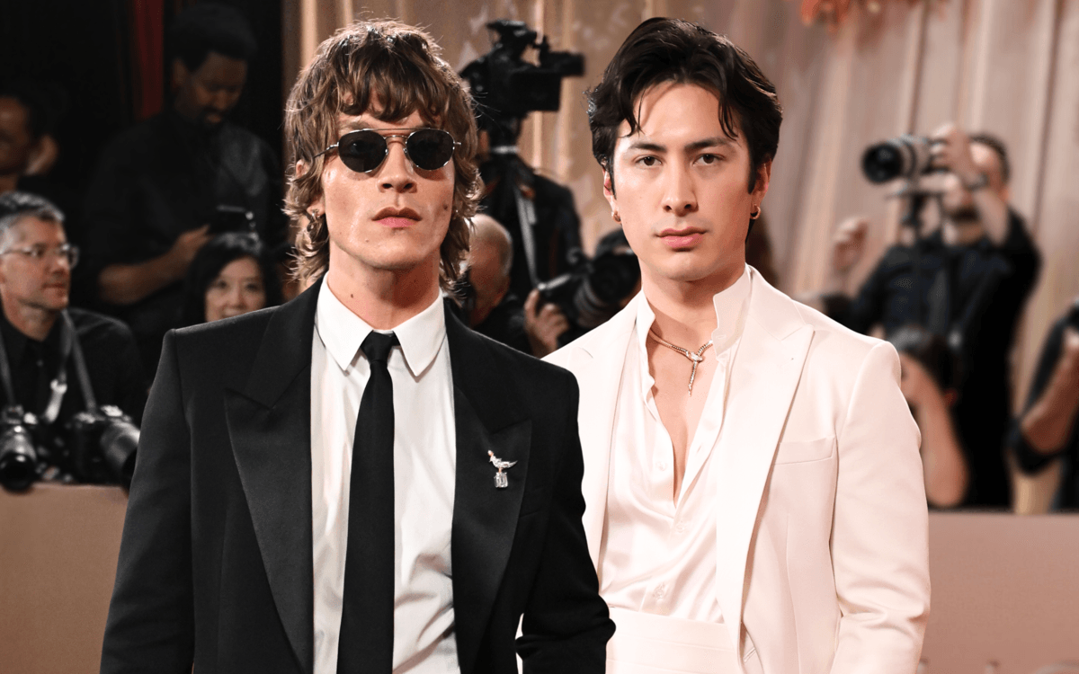 hudson williams and connor storrie, heated rivalry stars, at the 2026 golden globes