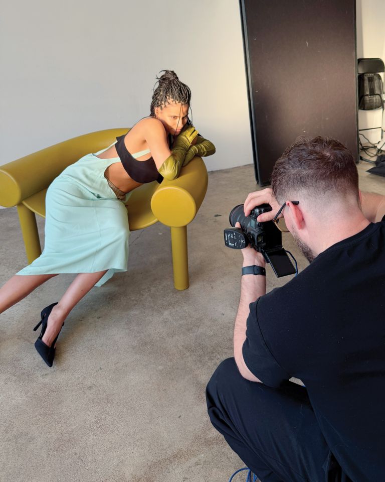 Zazie Beetz on set with Photographer Nick Merzetti during FASHION's April 2026 cover photoshoot.
