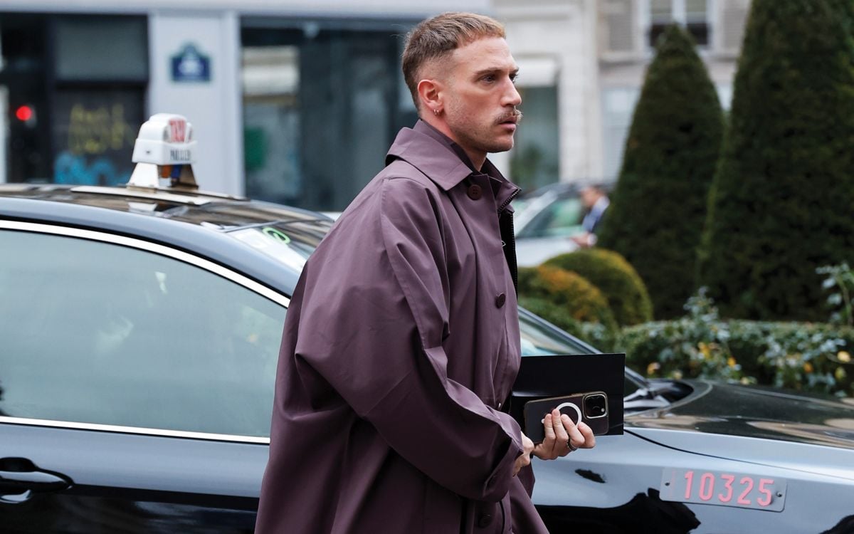 Man in purple trench coat