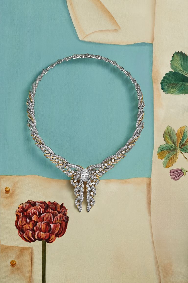 Tiffany Hidden Garden Necklace in platinum and 18k yellow gold with an G-color, VS1, oval diamond of 7.02 carats and diamond accents