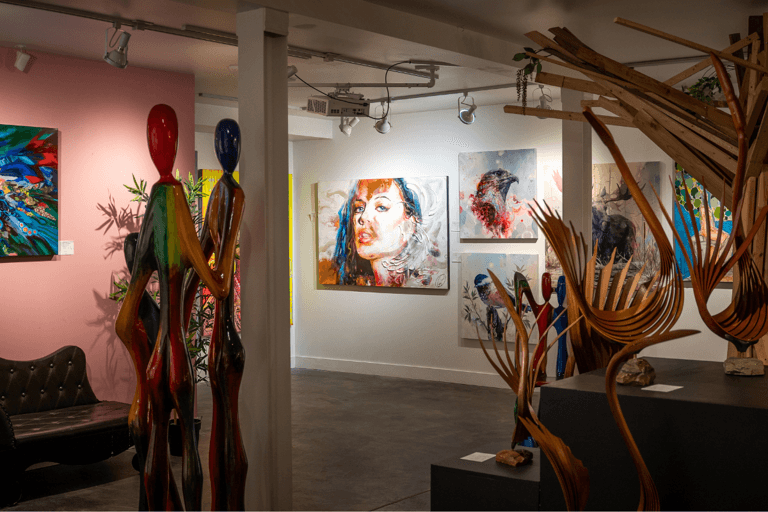 A colourful art gallery with glass sculptures.