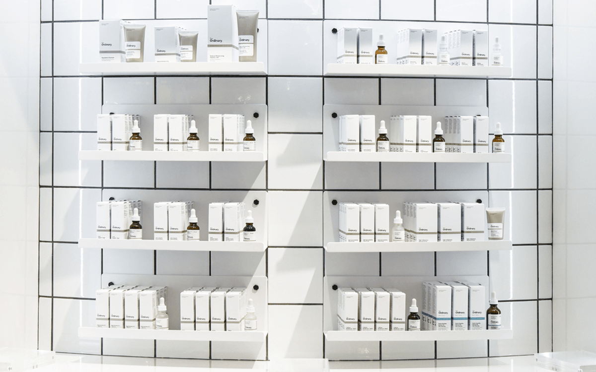 Several The Ordinary products on shelves