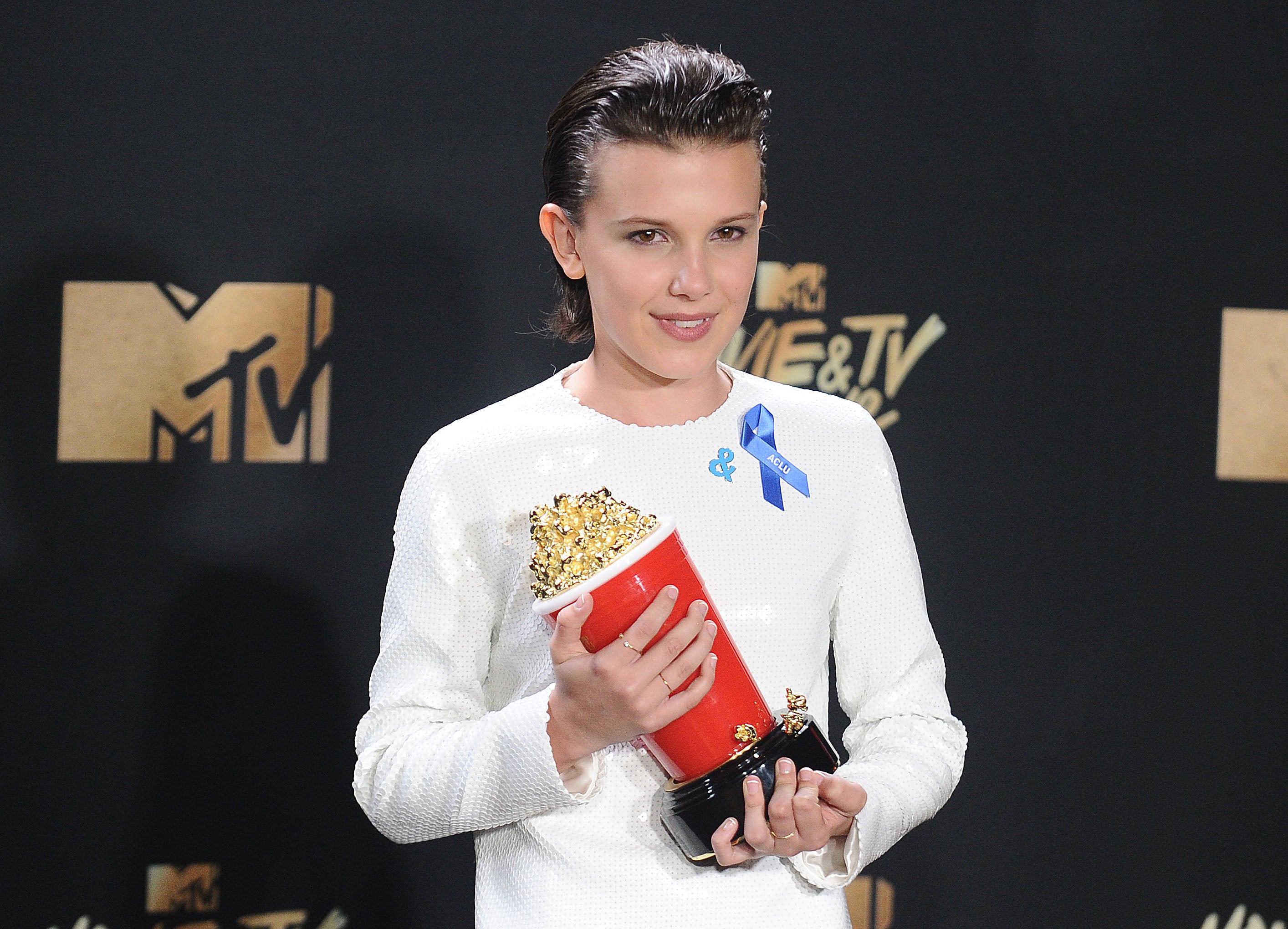 millie bobby brown red carpet white dress Millie Bobby Brown Wears Cut-Out Dress to Variety's Actors on Actors  Filming