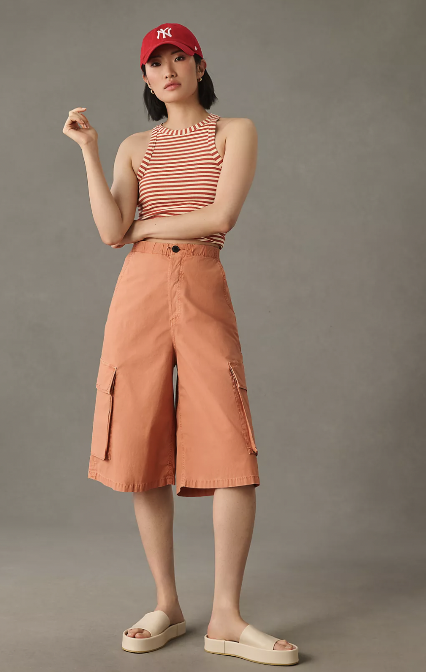 Woman in orange Anthropologie capris