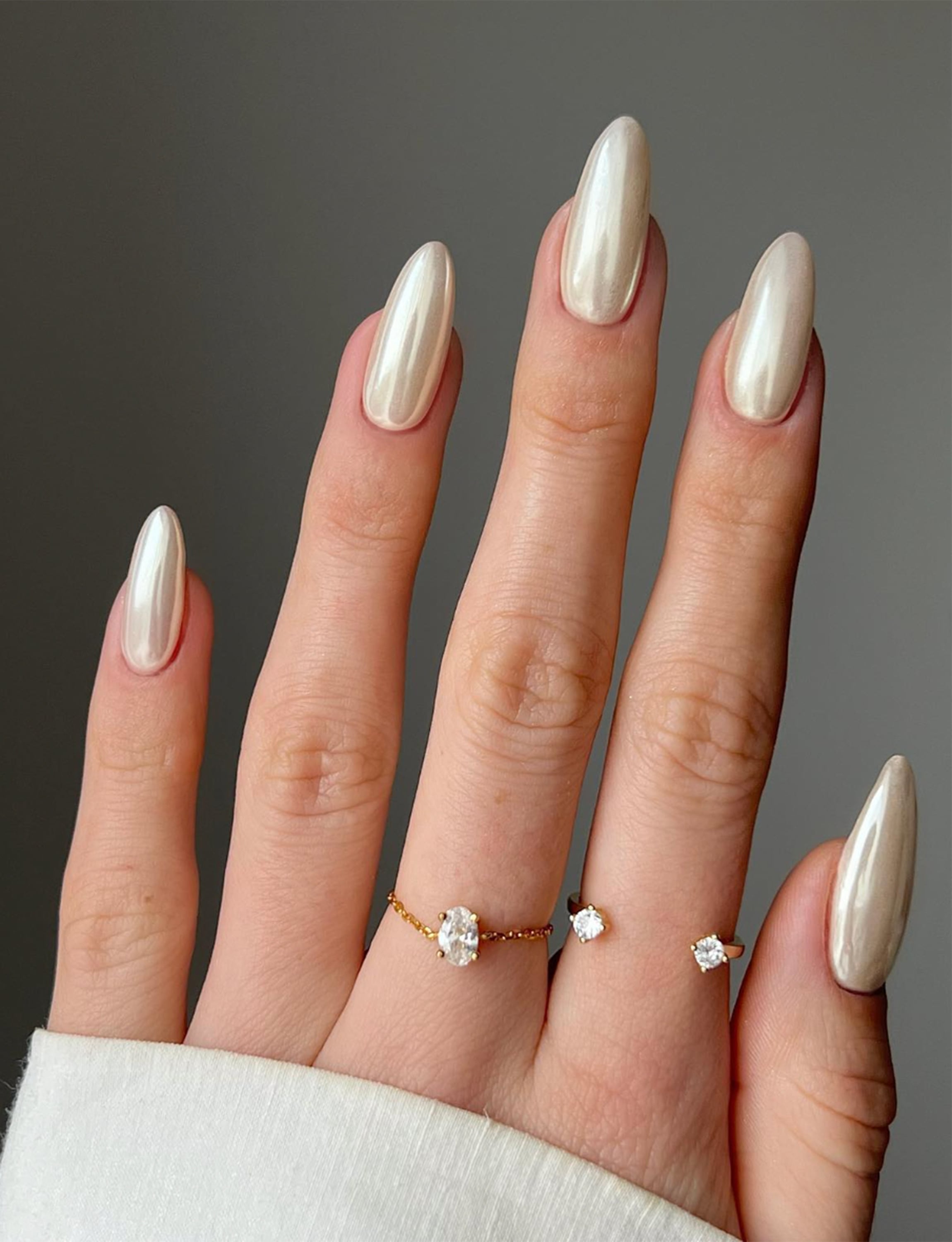 https://fashionmagazine.mblycdn.com/uploads/fm/2023/05/vanilla-chrome-nails_feature.jpg