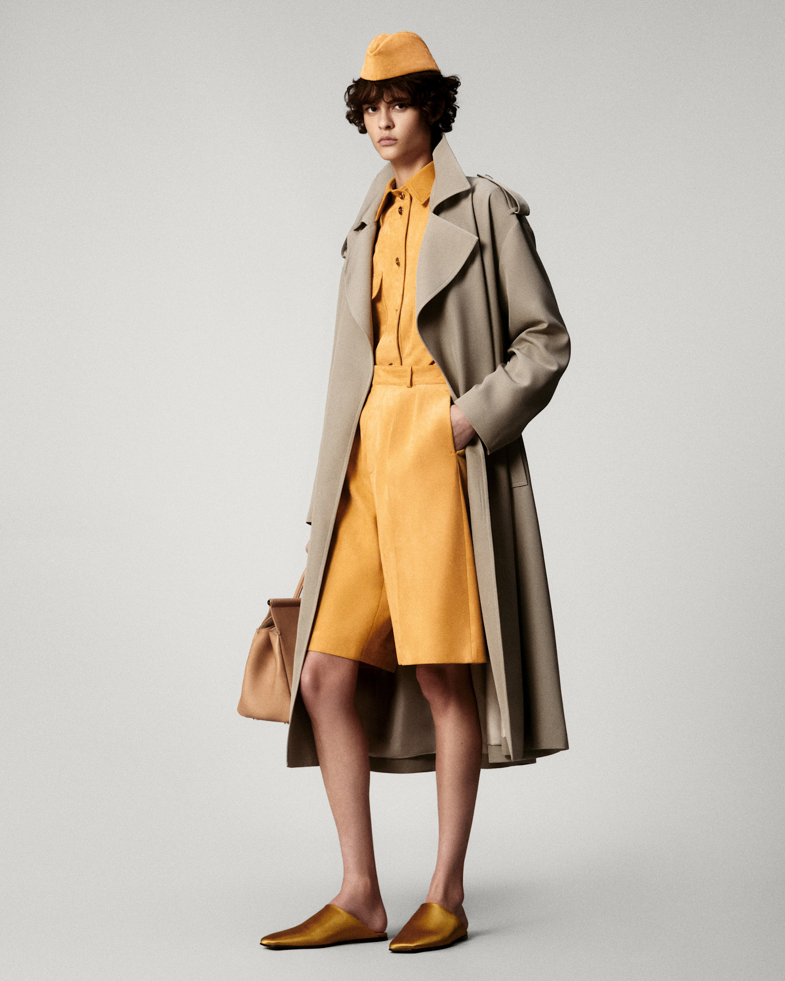 Fashion hats: A model wears a pillbox hat for Loro Piana's Spring 2025 campaign