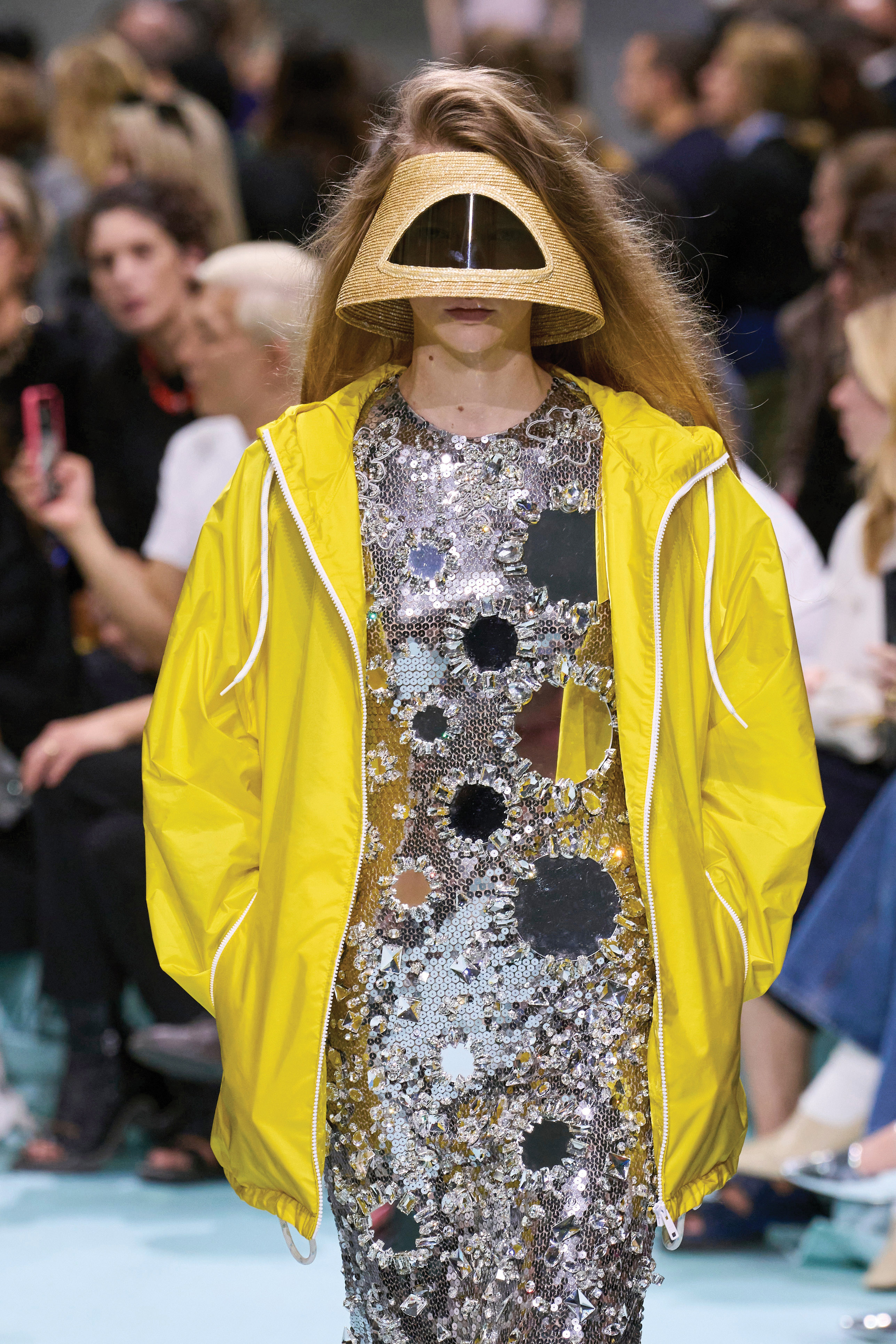 Fashion hats: A runway models wears a visor hat on the Prada Spring 2025 runway