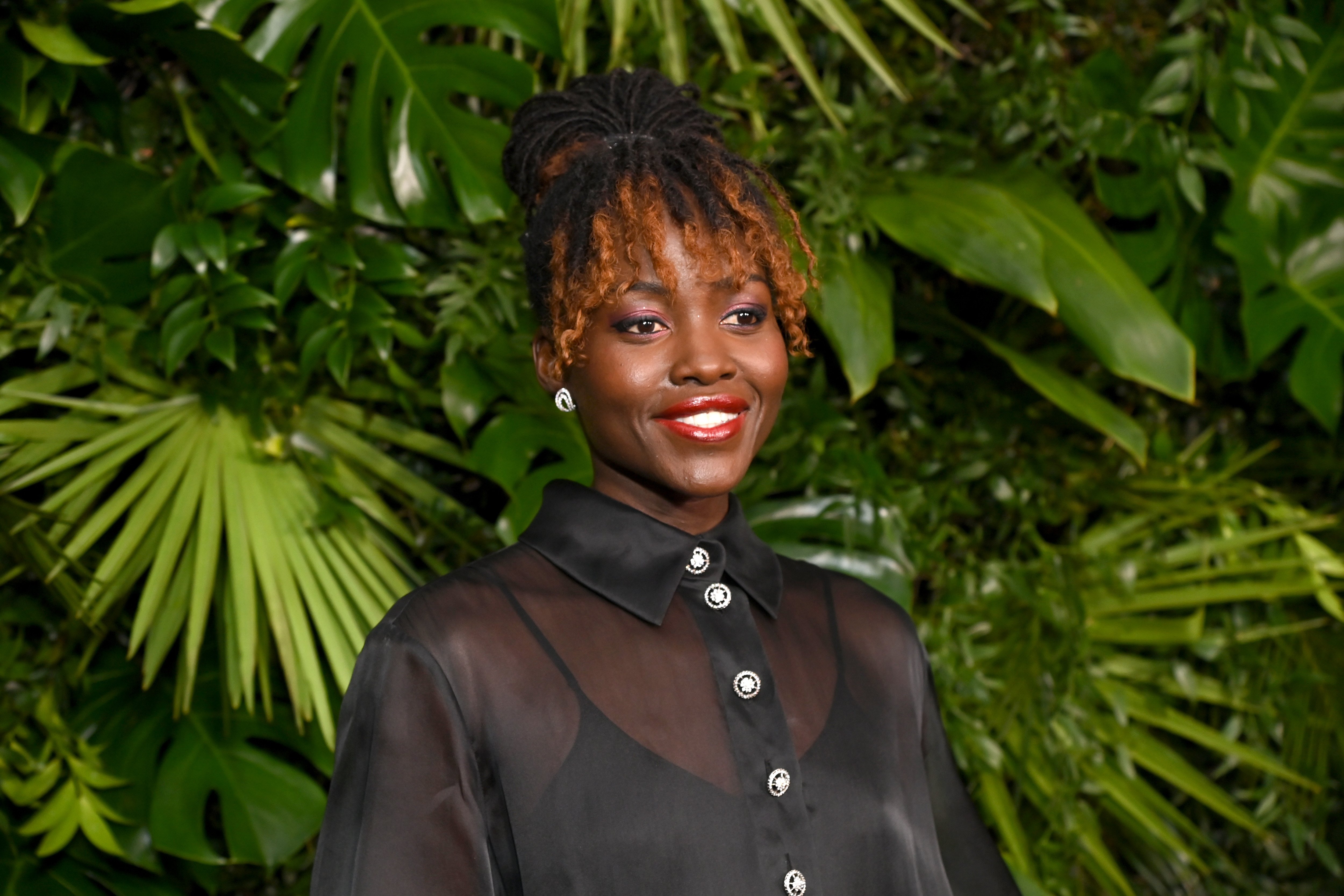 Lupita Nyong’o with curly bangs