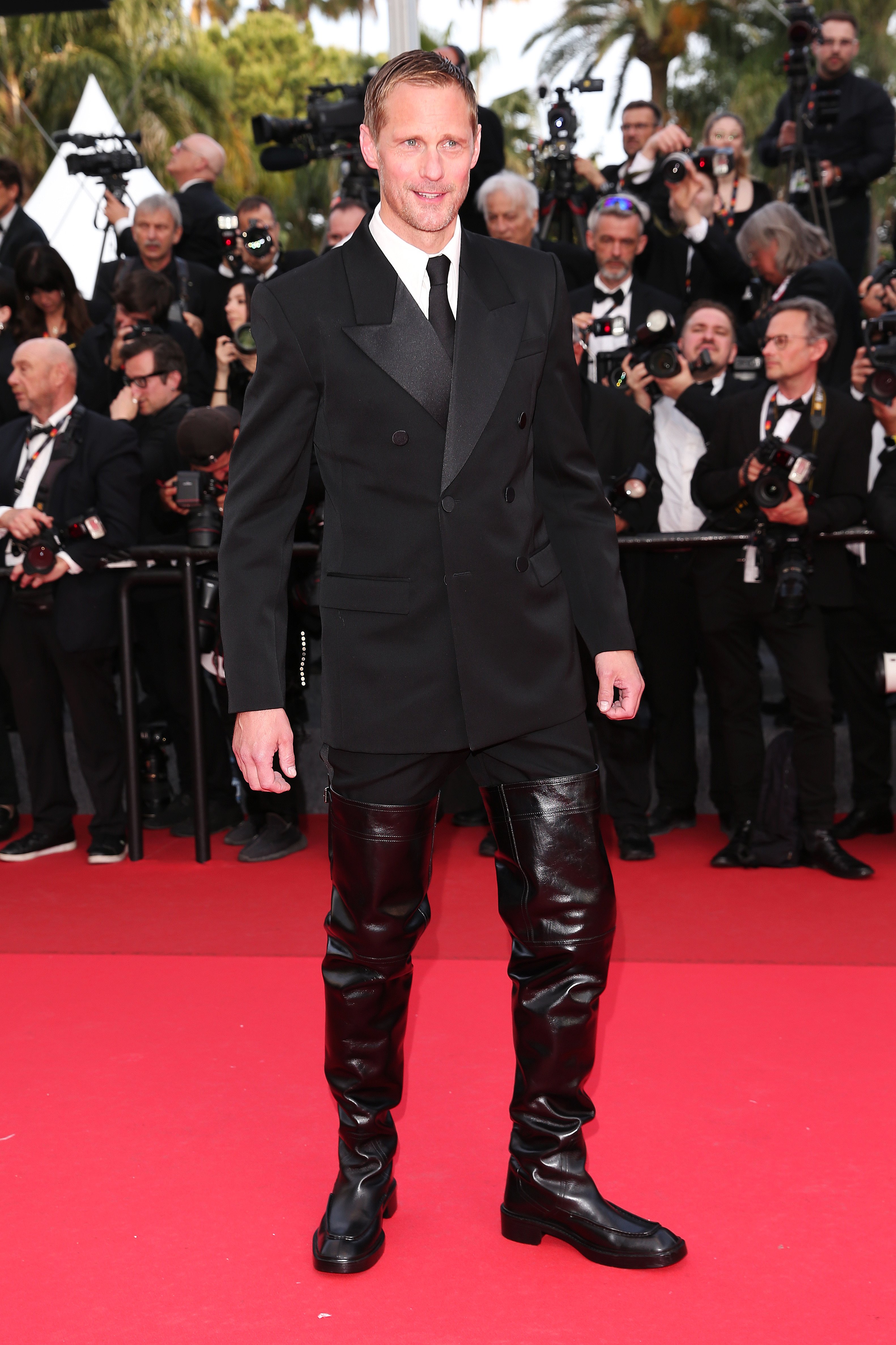 Alexander Skarsgård attends the "The Phoenician Scheme" red carpet in style at the 78th annual Cannes Film Festival at Palais des Festivals on May 18, 2025 in Cannes, France.
