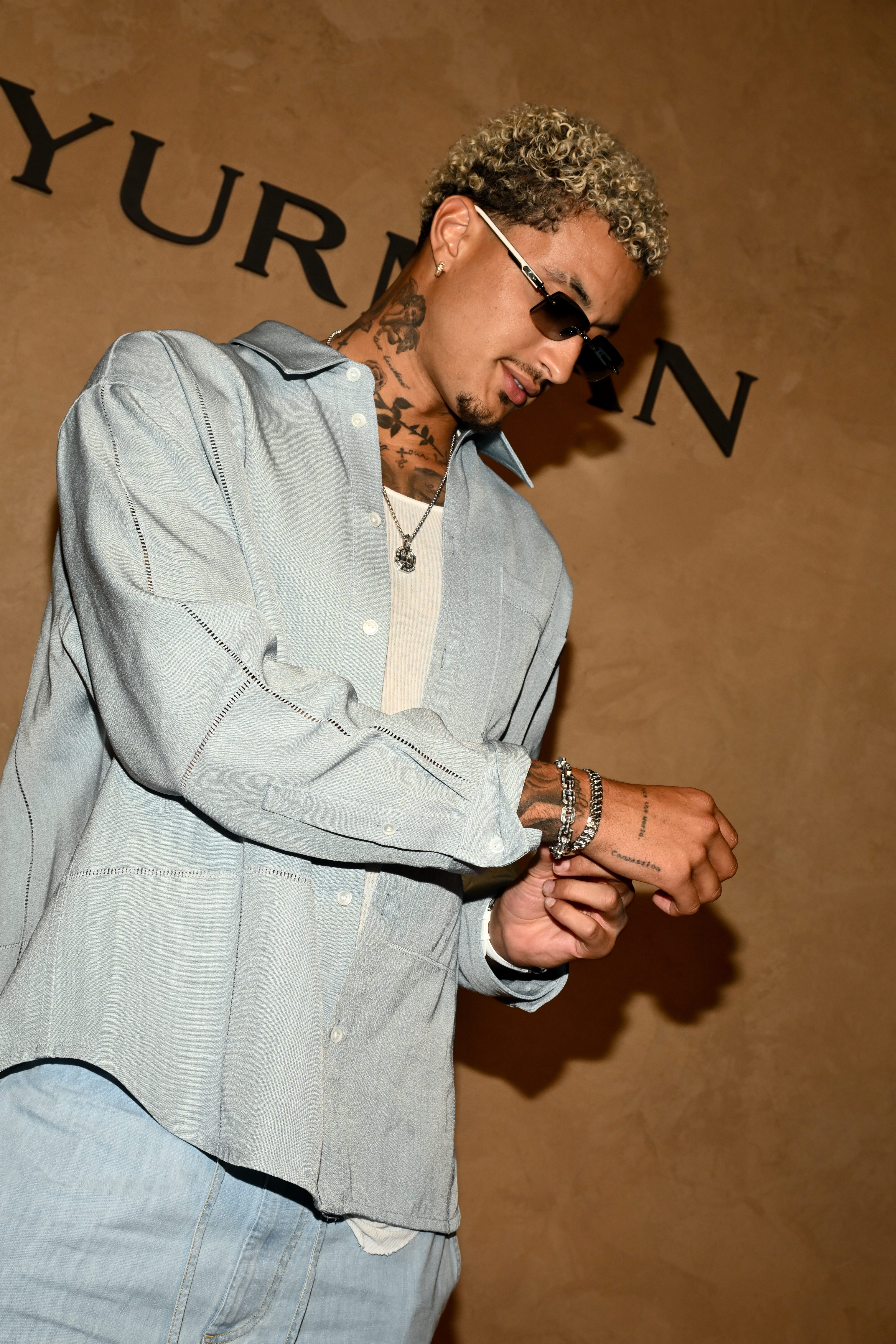 Kyle Kuzma at David Yurman Men's x NBA Launch Event wearing David Yurman necklaces and bracelets 