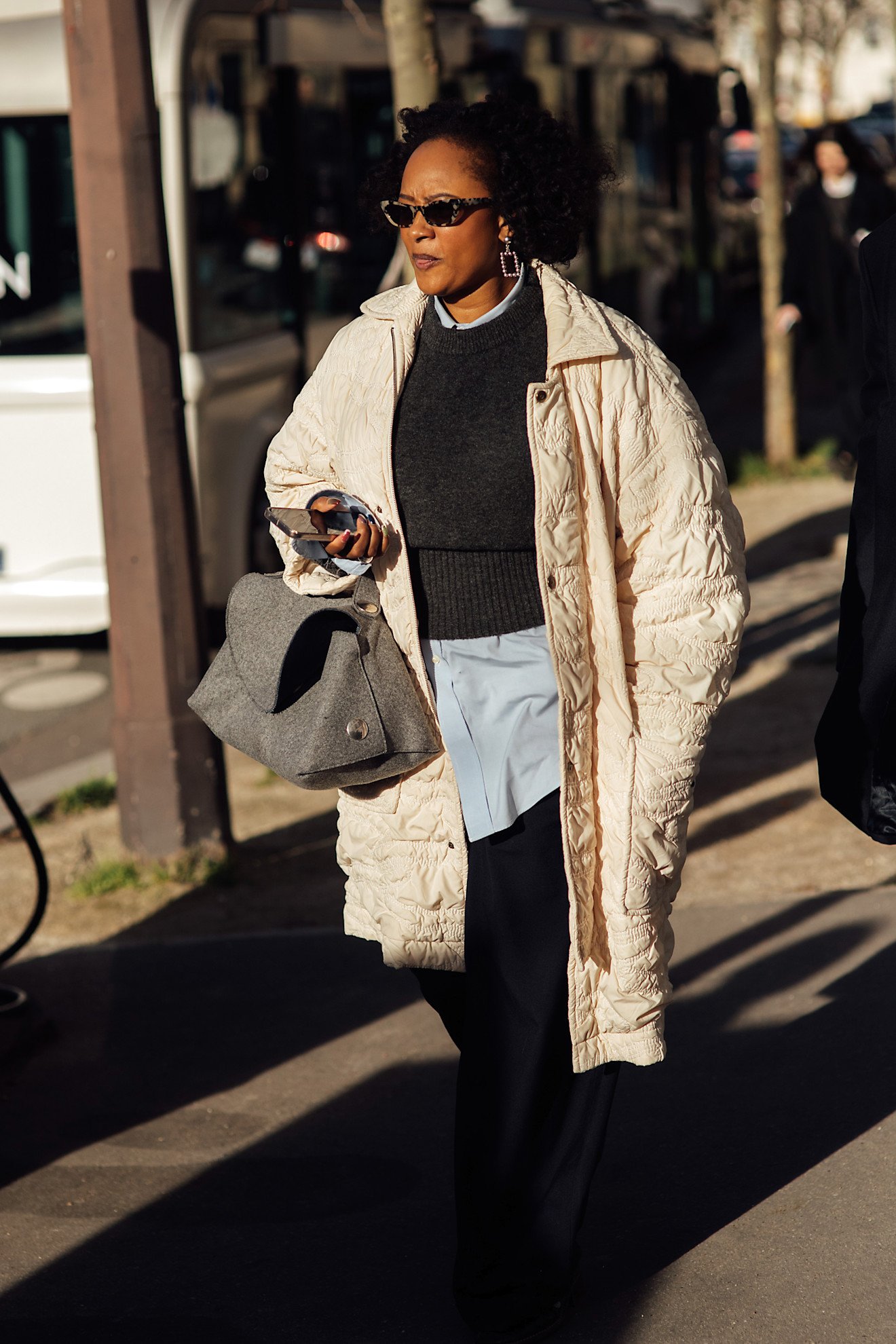 What is cashmere, cashmere wool: A street style image of a person wearing a cashmere sweater