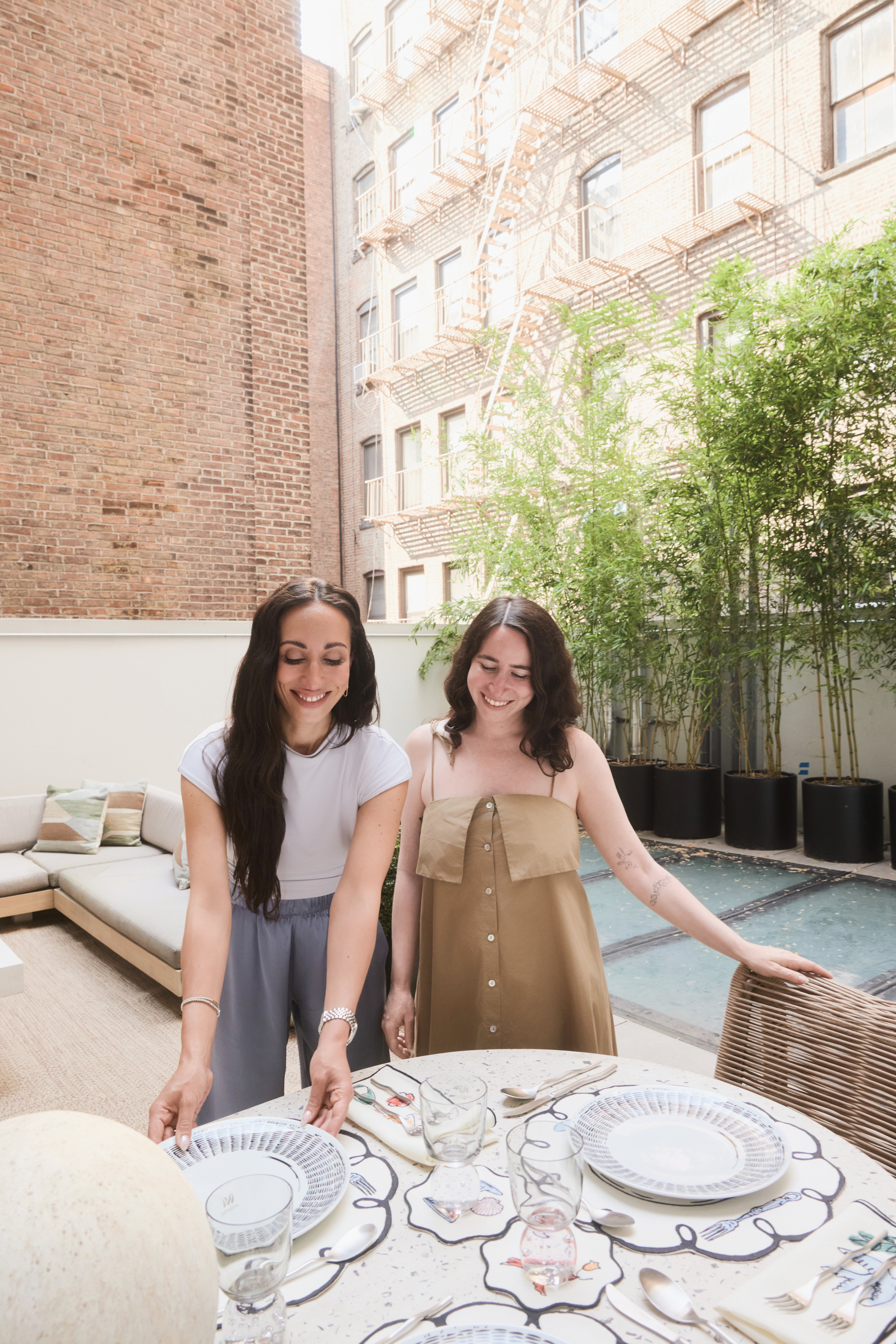 Amy Burstyn Fritz and Sarah Pecaut pose outside